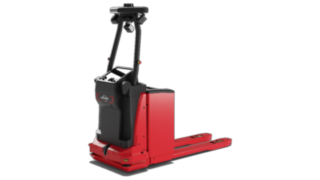 Il transpallet automatico T-MATIC core di Linde MH automatizza le operazioni di carico dei camion nell'area di uscita merci.